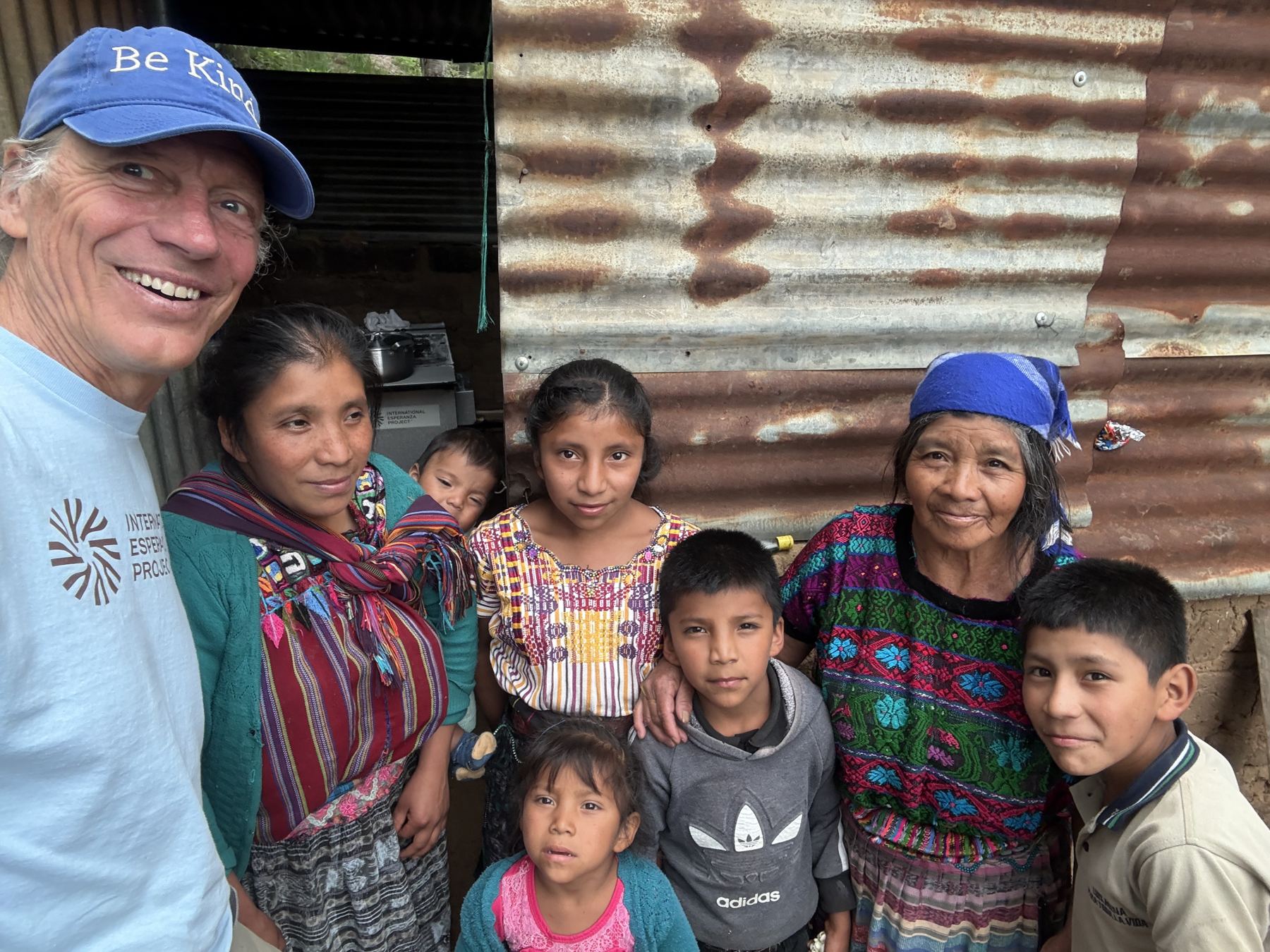 Volunteers with a family from the community