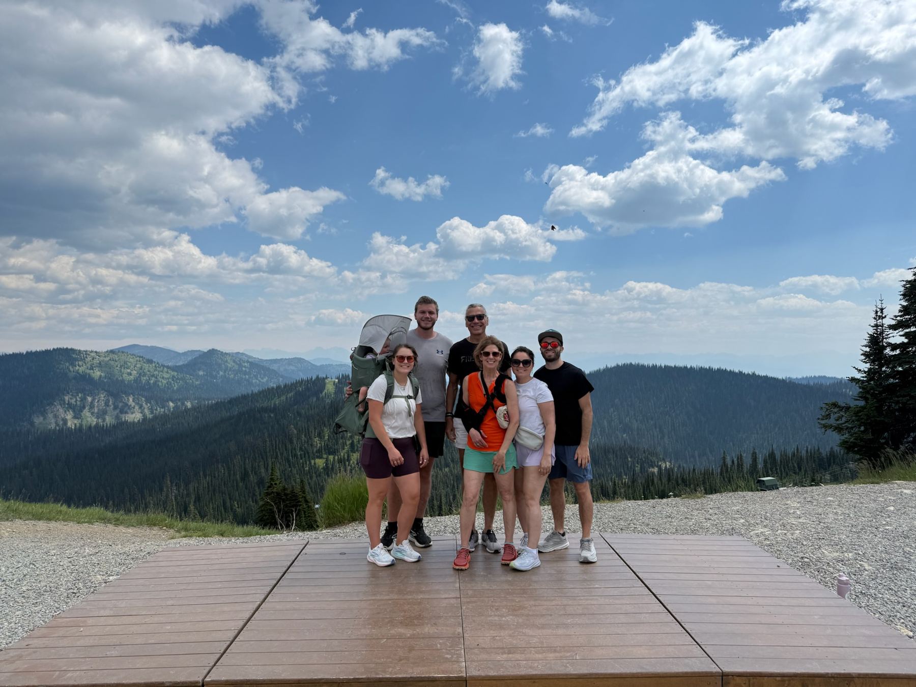 The family with the Montana mountains behind them
